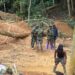Atiwa Forest Restored Calm as NAIMOS Officials Neutralize Illegal Mining Clash, Destroy Structures and Equipment