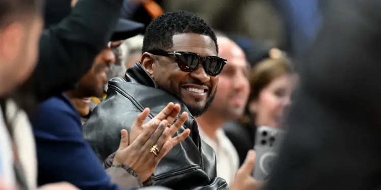 Usher Reacts to Bizarre Theory That A Clone Is Performing For Him